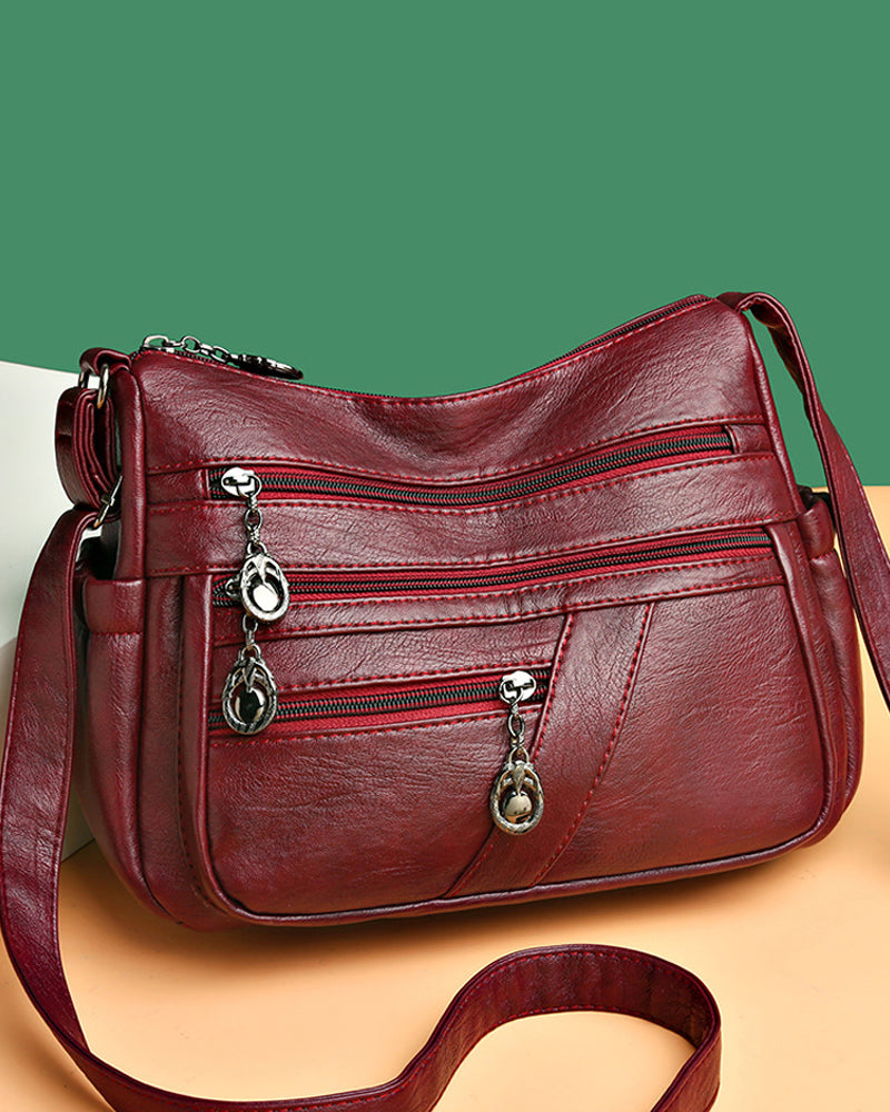 Sac bandoulière en cuir souple avec multipoches