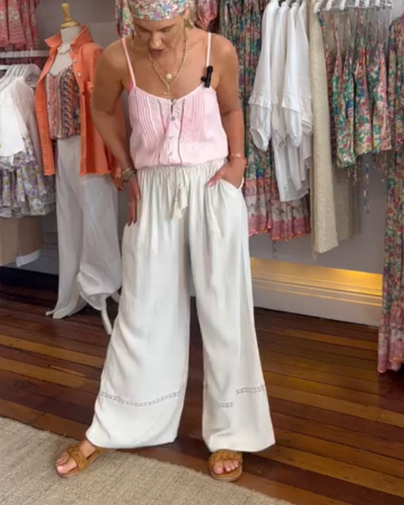 Pantalon large confortable de couleur unie avec poches