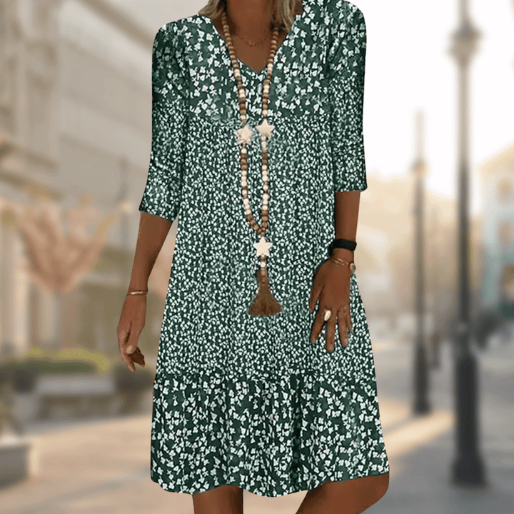 Solara | Robe midi à col en V et motif floral pour femme